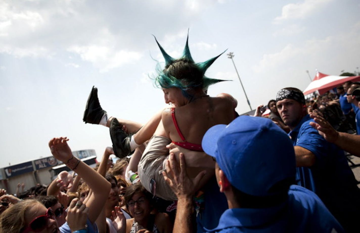 Crowd-surfing to Motion City Soundtrack at last year's Vans Warped Tour stop in Uniondale, N.Y. / AP photo by Brian Harkin