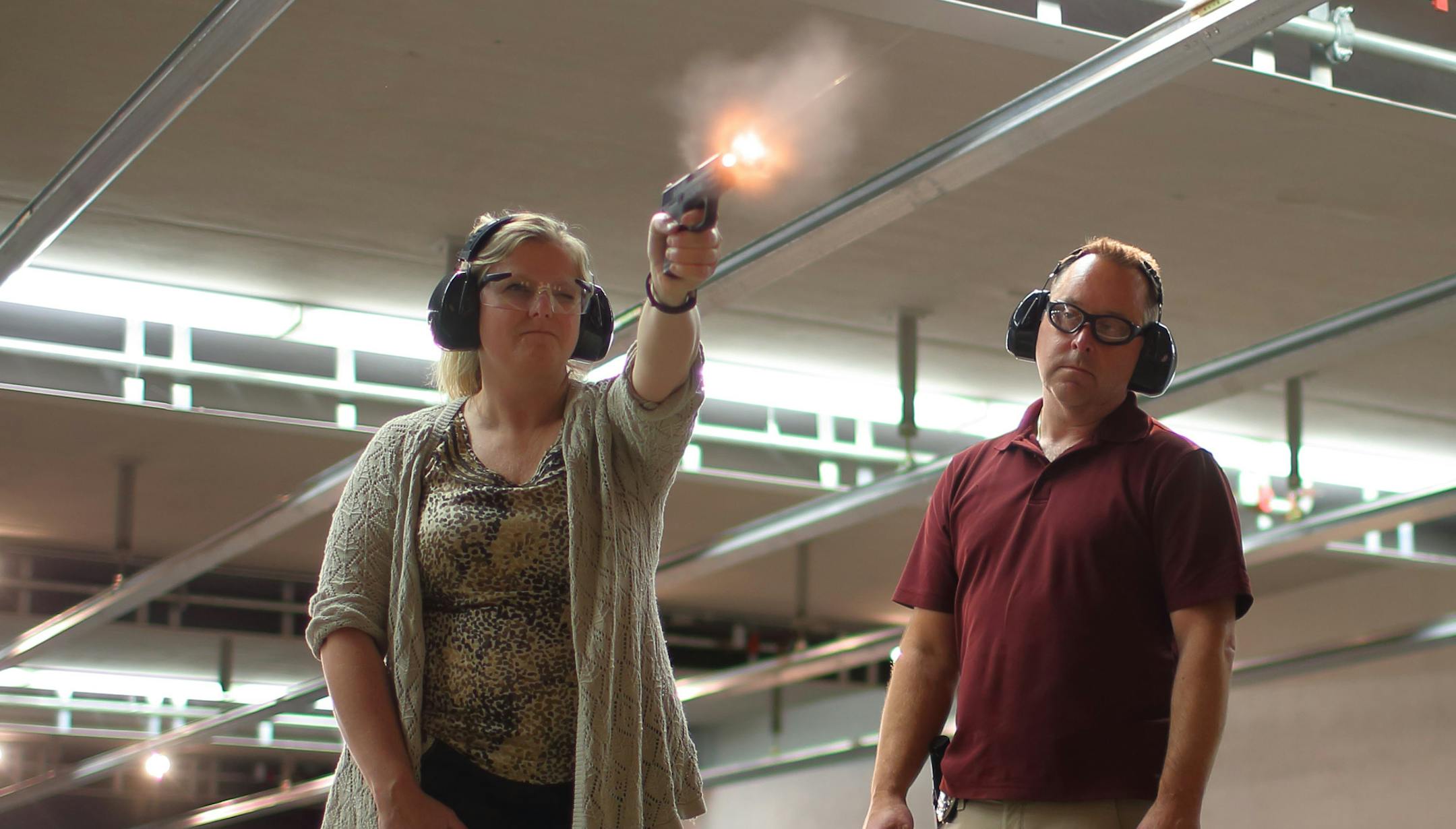 Brooklyn Park investigator Janese Brown fired her pistol under the supervision of Kent Nielsen, Brooklyn Park Police training officer.