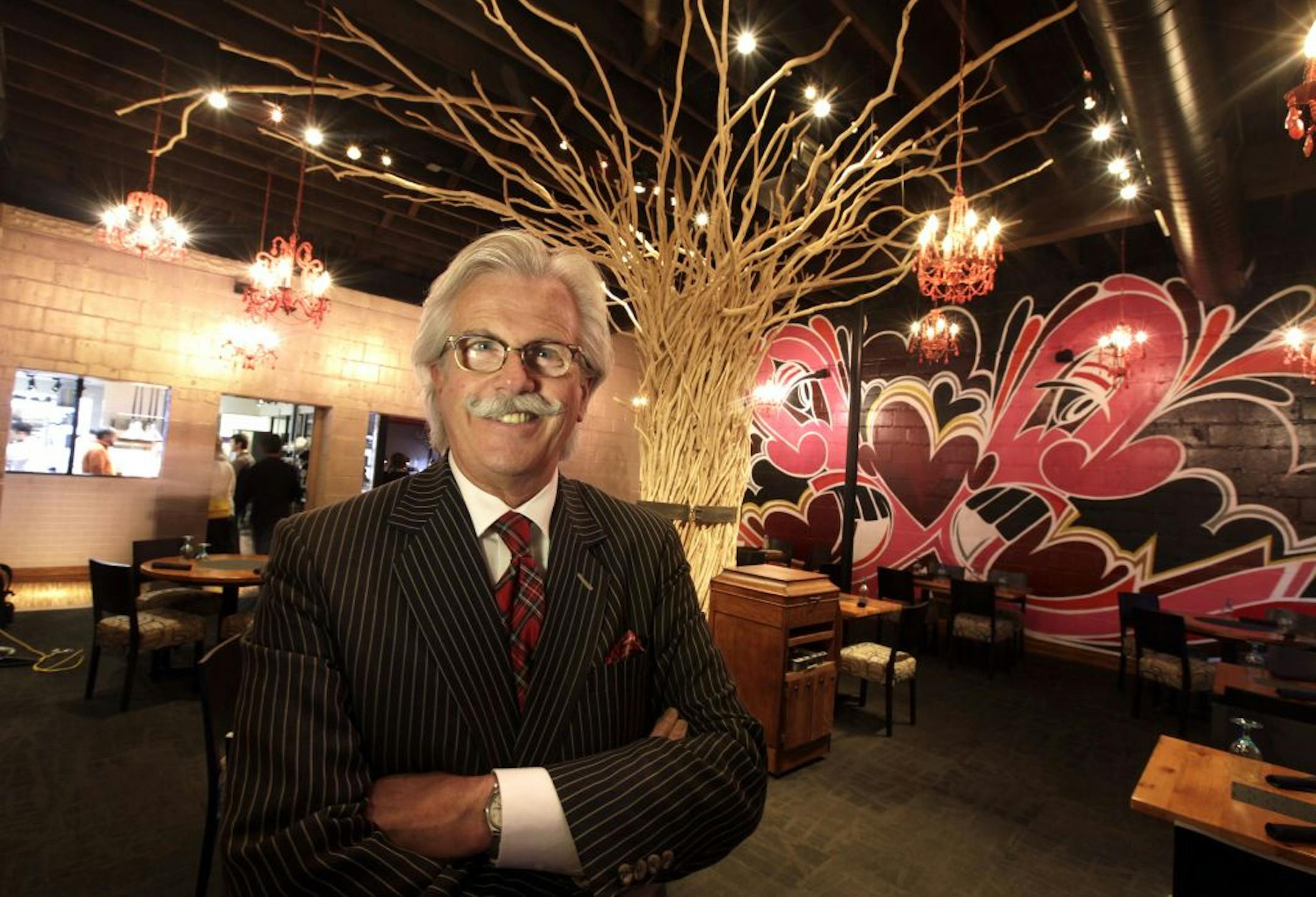 Jim Smart, restaurant architect, in the dining room of Heidi�s.