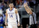 Kentucky's Tyler Herro celebrates after making a 3-point basket against Auburn during the first half of the Midwest Regional final game in the NCAA me