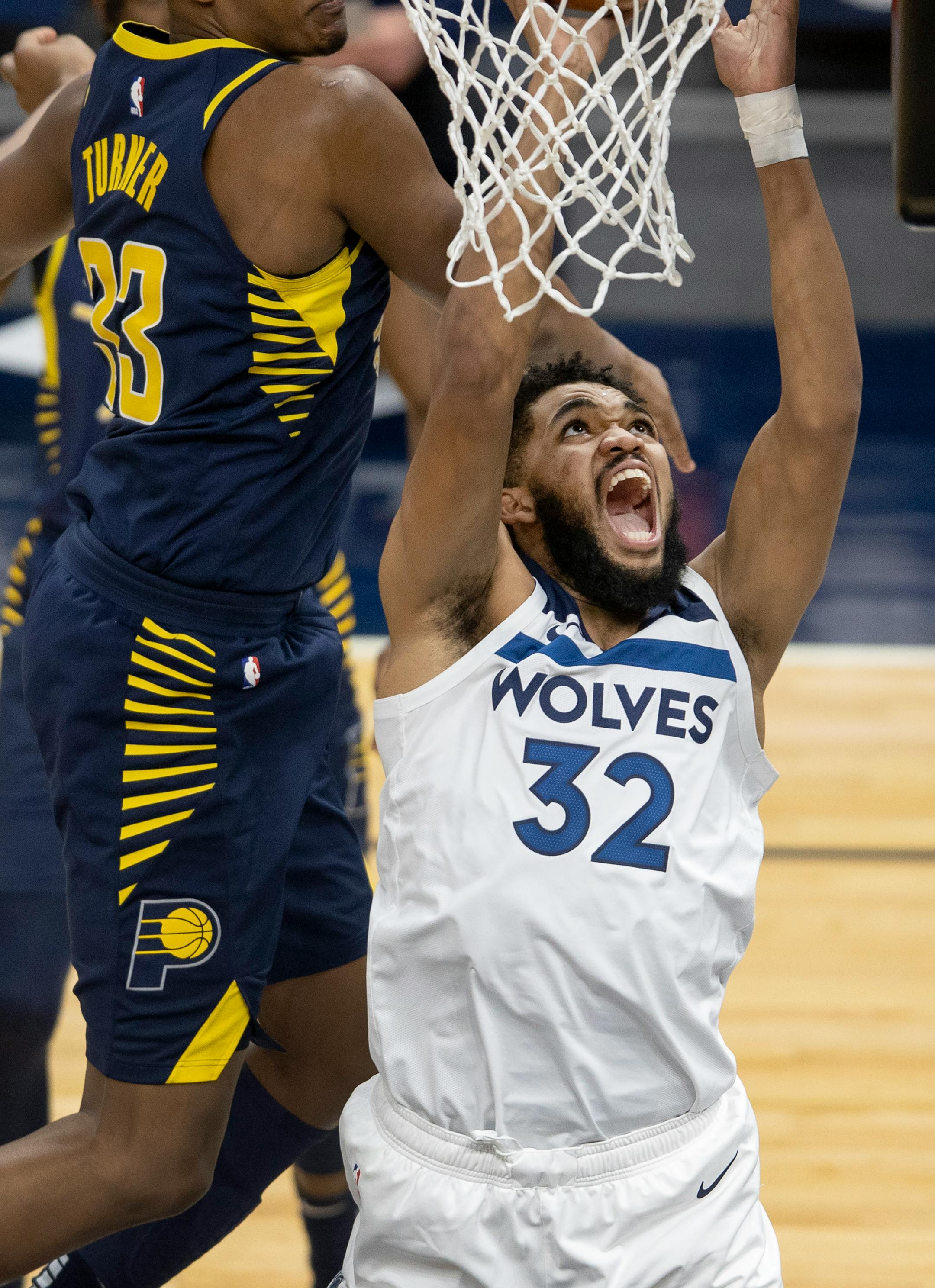 Minnesota Timberwolves Karl-Anthony Towns (32) attempted a shot on the second quarter.