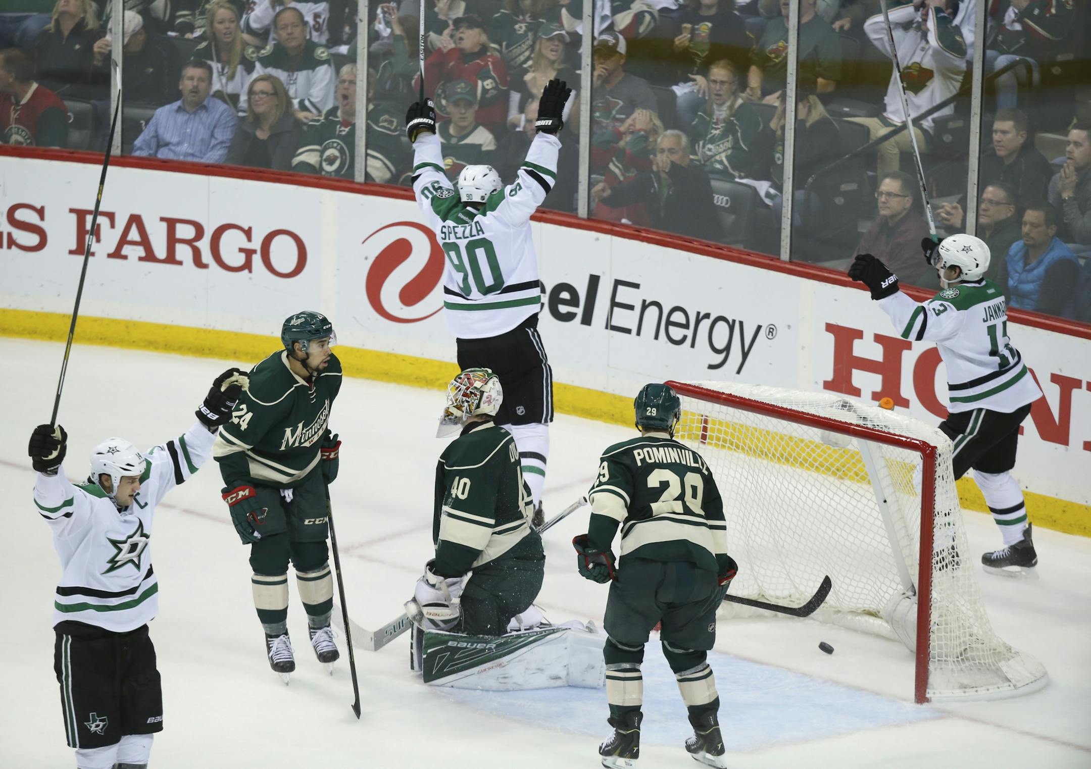 Dallas Stars center Jason Spezza (90) celebrated after he scored the go ahead on Wild goalie Devan Dubnyk (40) in the second period.