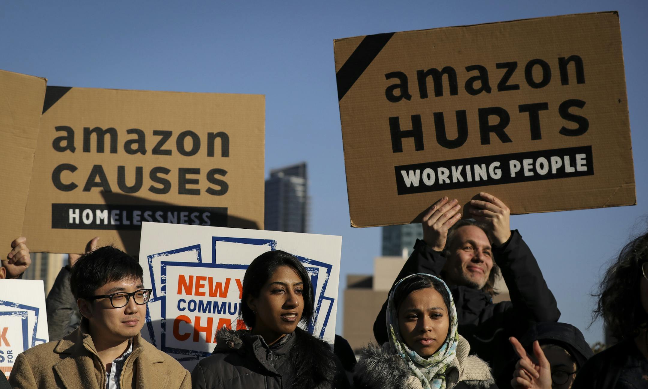 Activists and community members who opposed Amazon's plan to move into Queens rally in celebration of Amazon's decision to pull out of the deal, in the Long Island City neighborhood, February 14, 2019 in the Queens borough of New York City. Amazon said on Thursday that they are cancelling plans to build a corporate headquarters in Long Island City, Queens after coming under harsh opposition from some local lawmakers and residents. (Drew Angerer/Getty Images/TNS) ORG XMIT: 1271730