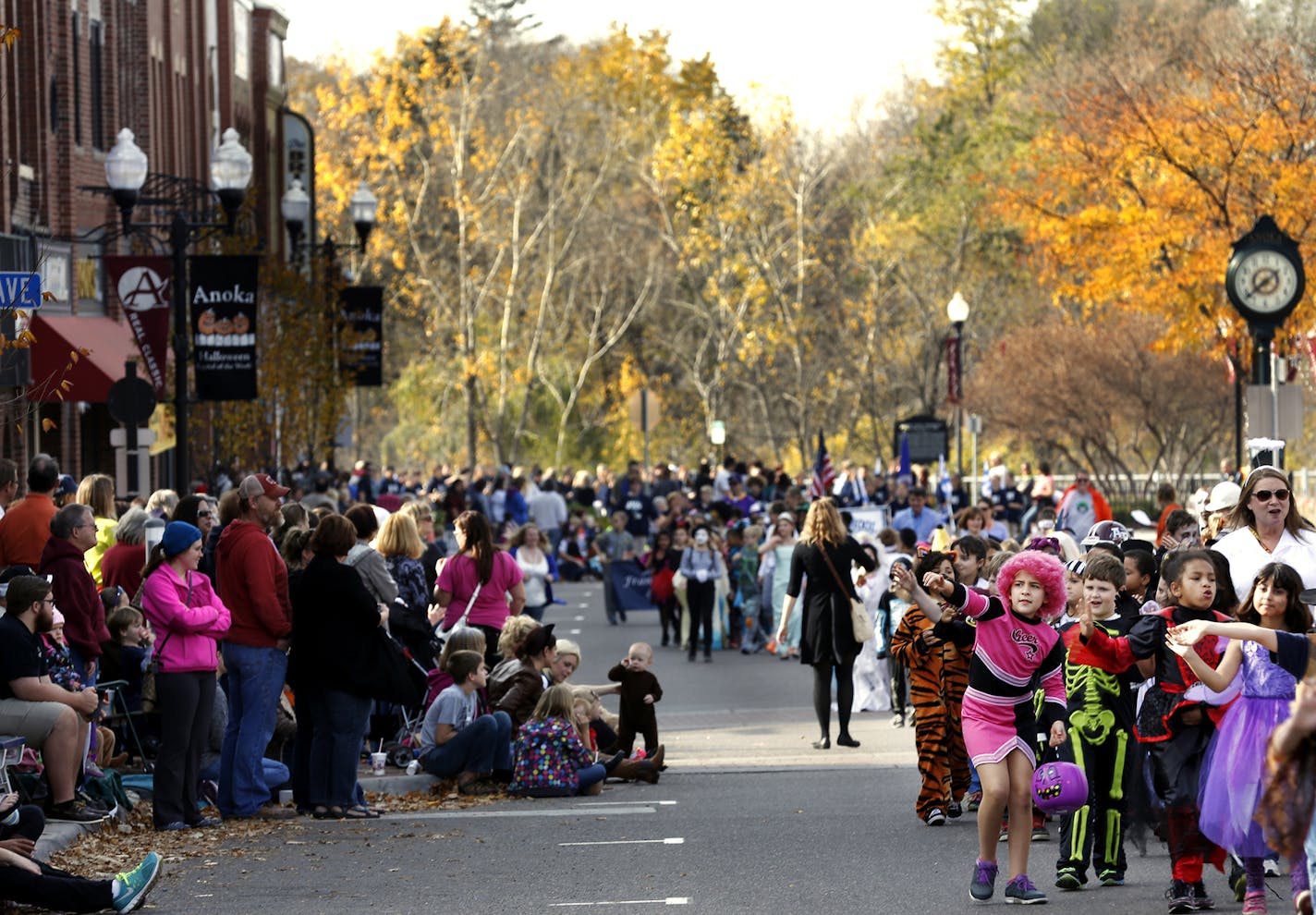 Costumed school children parade up Main Street in Anoka, Minn. during the Big Parade of Little People on Friday, October 25, 2014. Anoka bills itself as the "Halloween Capital of the World." ] LEILA NAVIDI leila.navidi@startribune.com / ORG XMIT: MIN1410241625564827