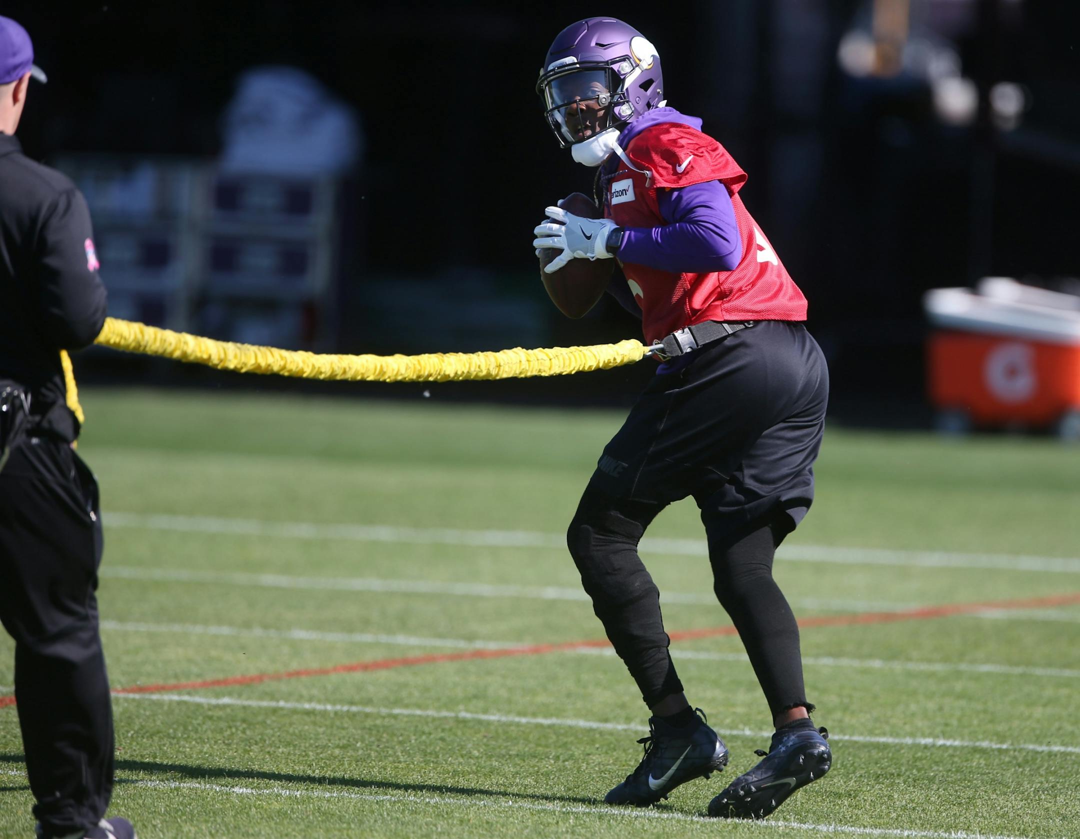 Minnesota Vikings quarterback Teddy Bridgewater worked on drills with trainer Tom Hunkele Wednesday May 31,2017 in Eden Prairie, MN.