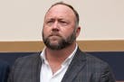 Infowars host Alex Jones has offered to pay $120,000 per plaintiff to resolve a lawsuit by relatives of Sandy Hook Elementary School shooting victims 