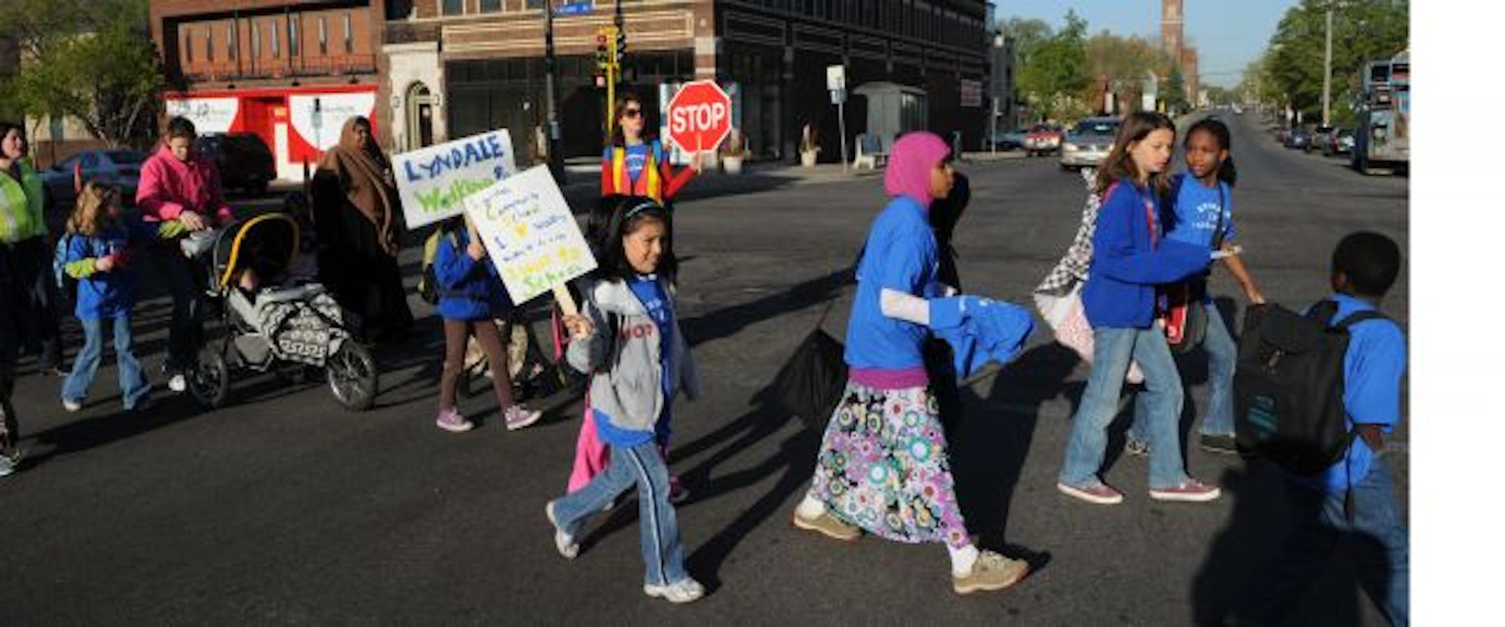 About 20 students made their way along Nicollet Avenue on Thursday morning on their way to Lyndale Community School. The neighborhood's "walking school bus'' is an effort to promote exercise and health. And it might even lead to better grades and test scores.