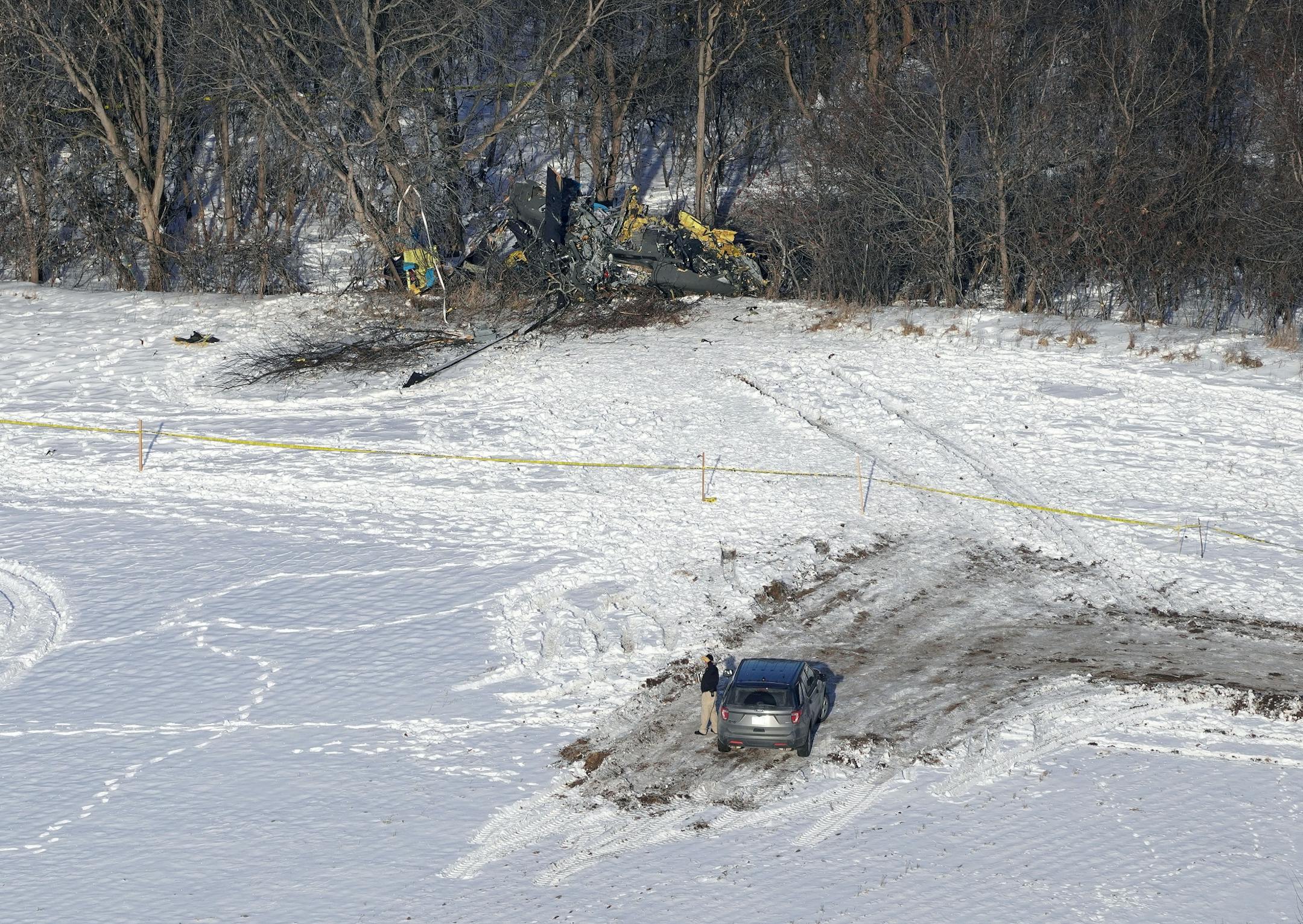 The crash site of a Minnesota National Guard Black Hawk helicopter that killed three service members Thursday afternoon was found in the trees on the edge of a farm field southwest of Marty, Minn.