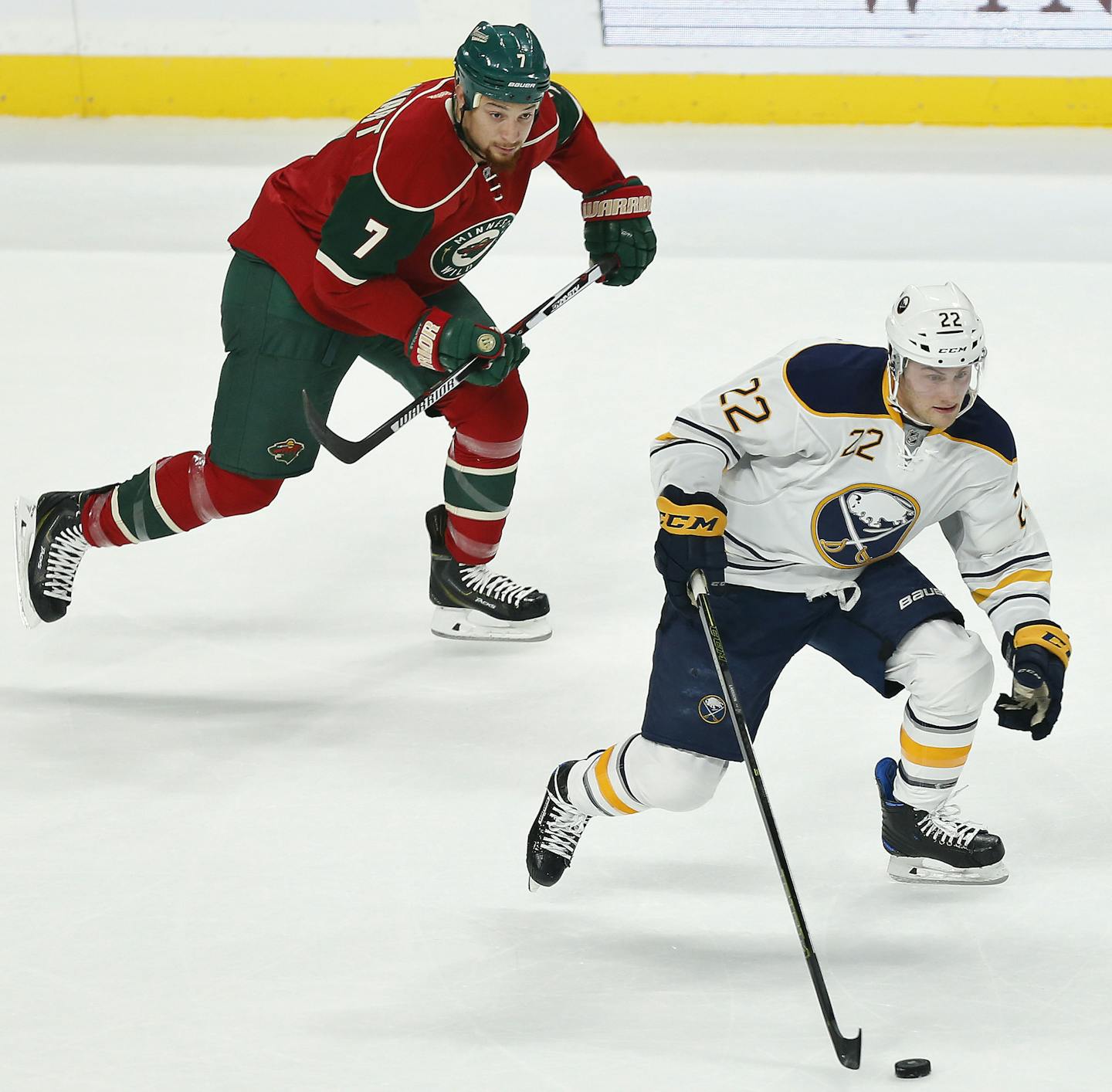 Buffalo Sabres' Johan Larsson, right, controls the puck against Minnesota Wild's Chris Stewart chases in the first period of an NHL hockey game Tuesday, Nov. 1, 2016, in St. Paul, Minn. (AP Photo/Stacy Bengs)