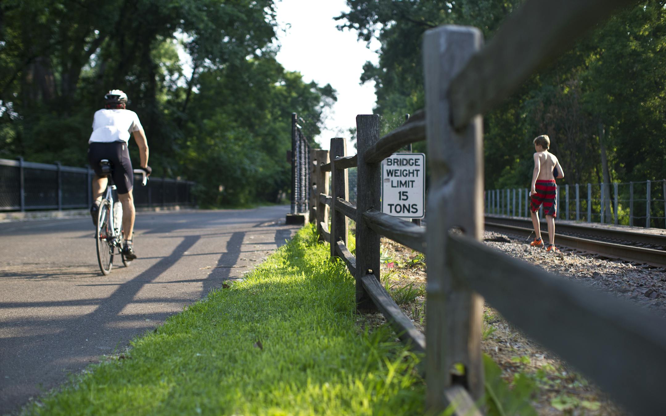 The Cedar Lake Trail alongside a current freight train track that has been a proposal sight for the Southwest Corridor light rail line in St. Louis Park, Minn.