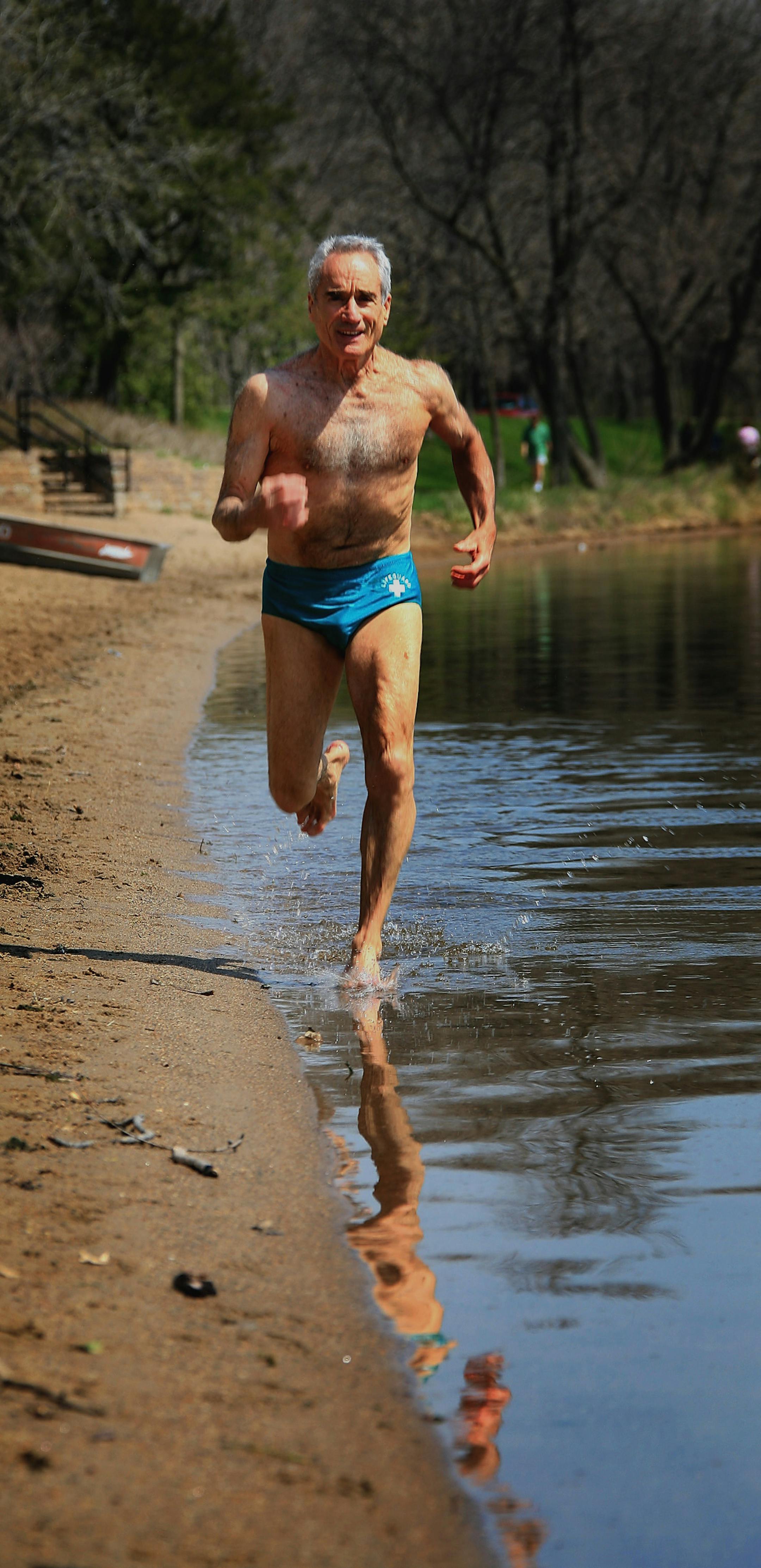 Lou Harris, runs in Lake Harriet, where he trains for triathlons. If the weather cooperates and he can get in enough training, he will compete in the World Championships in Vancover, Canada.