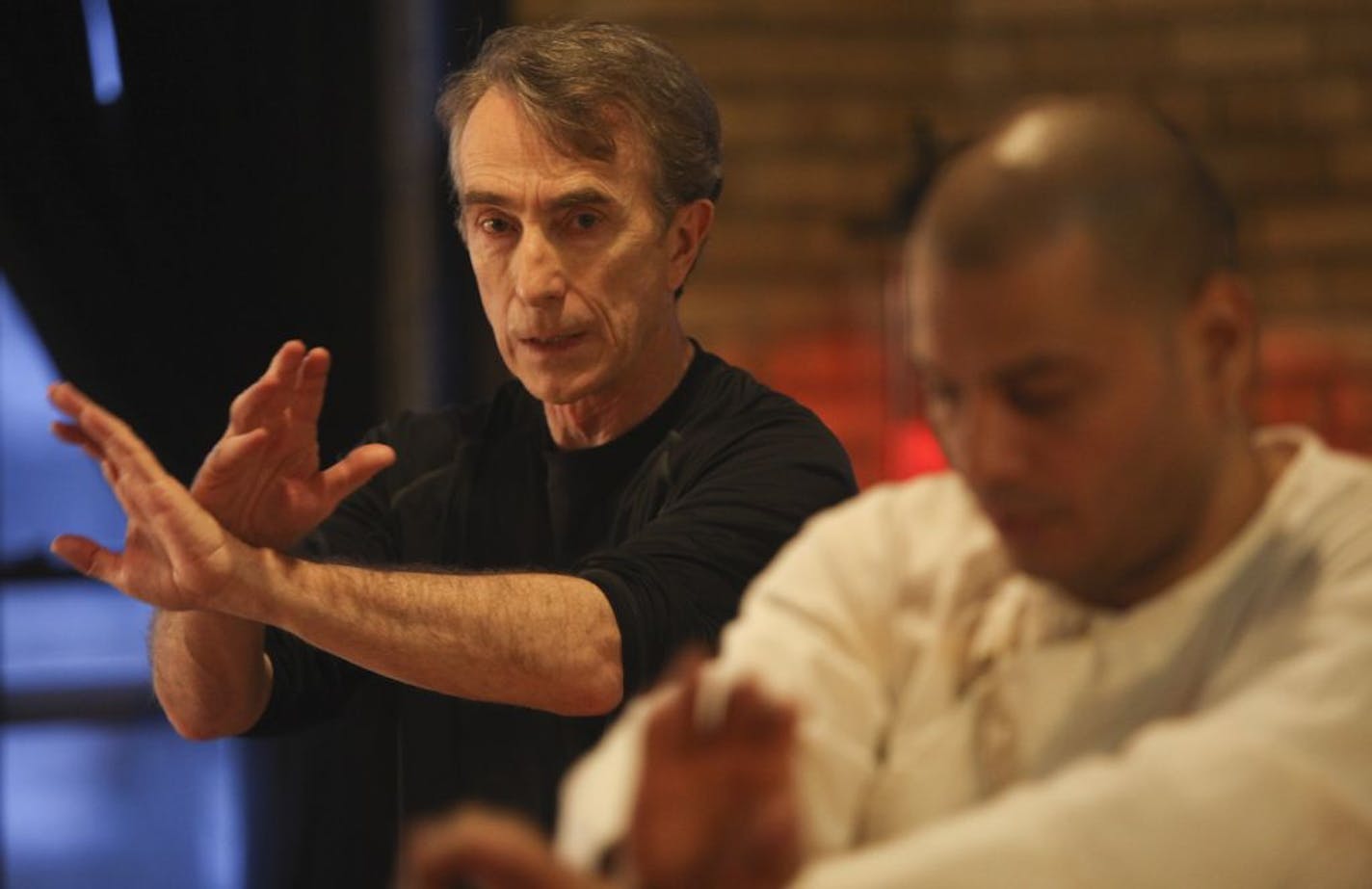 John Du Cane, 63, worked with Chen Tai Chi instructor Jose Figueroa on an empty hand kata during his private lesson in St. Paul Min., Wednesday, April 18, 2012. Du Cane was one of the first people certified kettlebell trainer in the country who also internal martial arts and Chen Tai Chi.