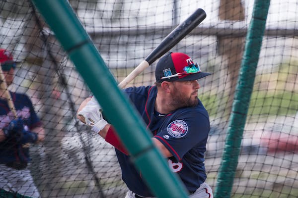Twins catcher Bobby Wilson practiced his swing during spring training.