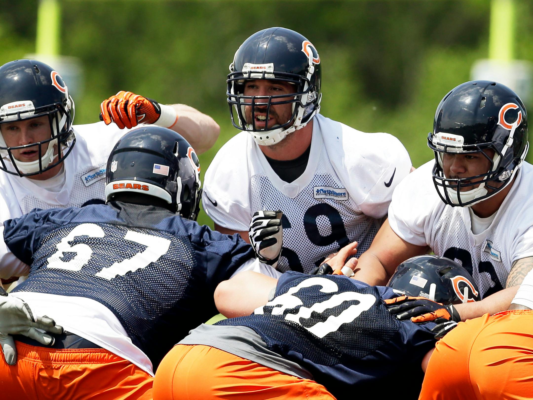 Chicago Bears defensive end Jared Allen (69) works with teammates during NFL football practice in Lake Forest, Ill., Tuesday, May 27, 2014. (AP Photo/Nam Y. Huh)