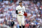 Minnesota Twins pitcher Pablo Lopez (49) reacts after a strikeout in Game 1 of the 2023 ALDS, a Twins victory that snapped an 18-game postseason losin