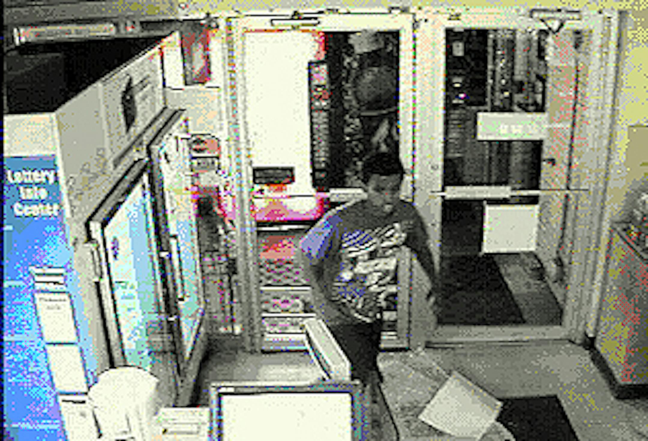 Video snapshot from the Heights Liquor robbery.