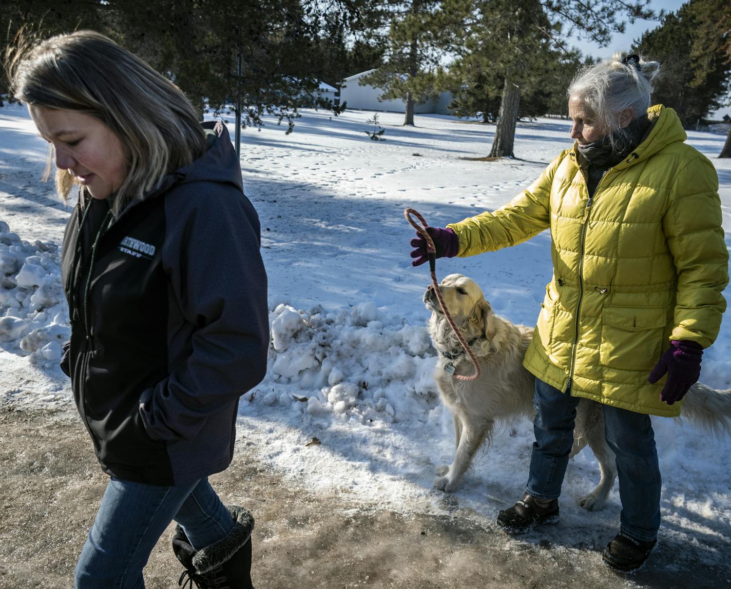 Kristin Kasinskas, left, said that around 4 p.m. Thursday, Jan. 10, 2019, Jeanne Nutter, left, and her dog, Henry, brought Jayme Closs to their their door step after encountering the teen outside in Gordon, Wis.