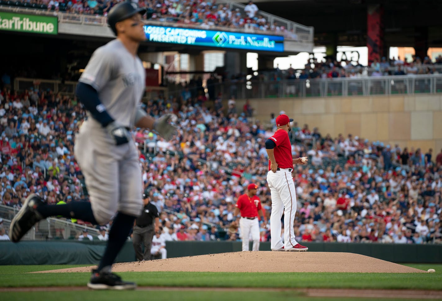 Twins starting pitcher Martin Perez reacts after issuing a walk to Aaron Judge in July at Target Field.