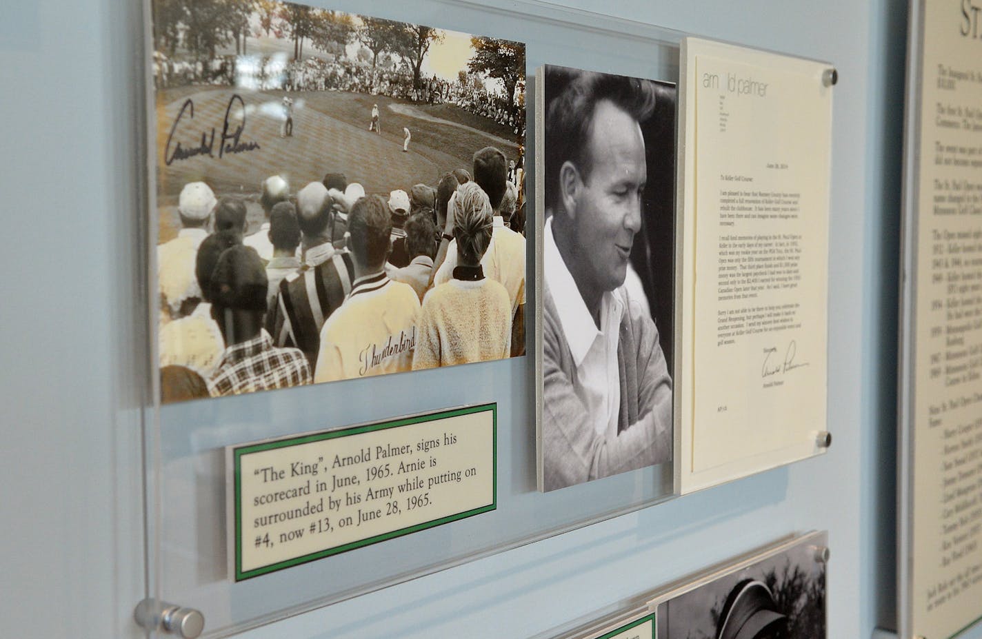 The wall of memorabilia, including photos and a letter from Arnold Palmer, sits just inside the clubhouse, overlooking Hole 1 of Keller Golf Course. ] (SPECIAL TO THE STAR TRIBUNE/BRE McGEE) **Keller Golf Course, Arnold Palmer (golf professional)