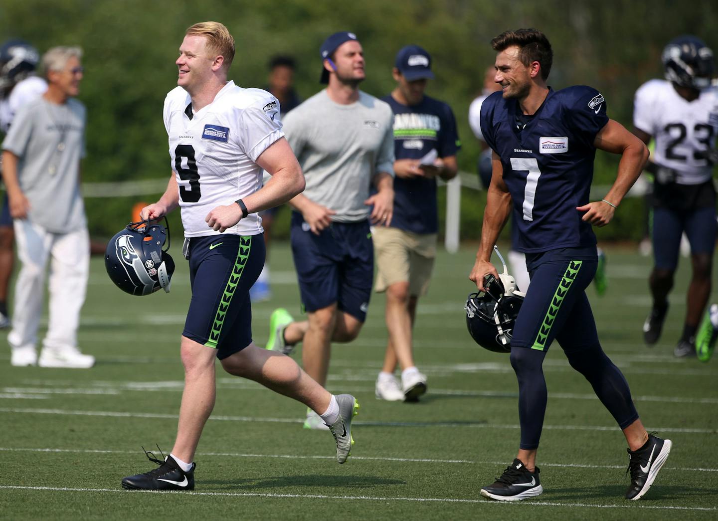 Seattle Seahawks punter Jon Ryan (9) and kicker Blair Walsh (7) take to the field for NFL football training camp, Thursday, Aug. 3, 2017, in Renton, Wash. (Ken Lambert/The Seattle Times via AP)