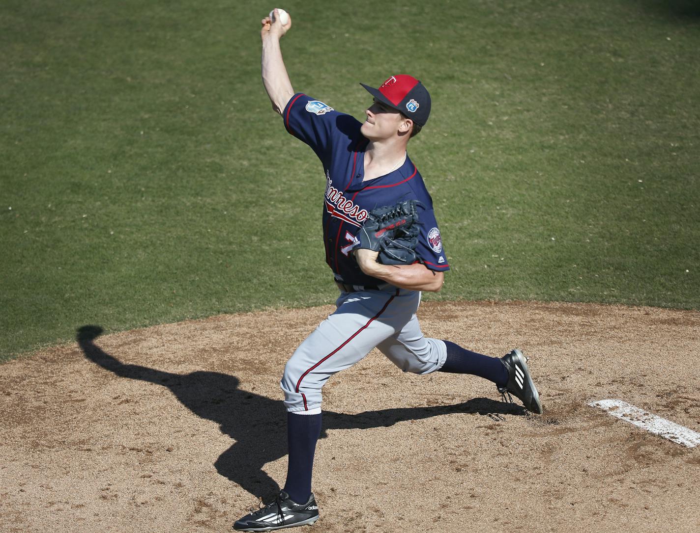 Twins reliever Nick Burdi, here throwing in a Feb. 28 workout, said his fastball has been clocked as fast as 103 miles per hour.