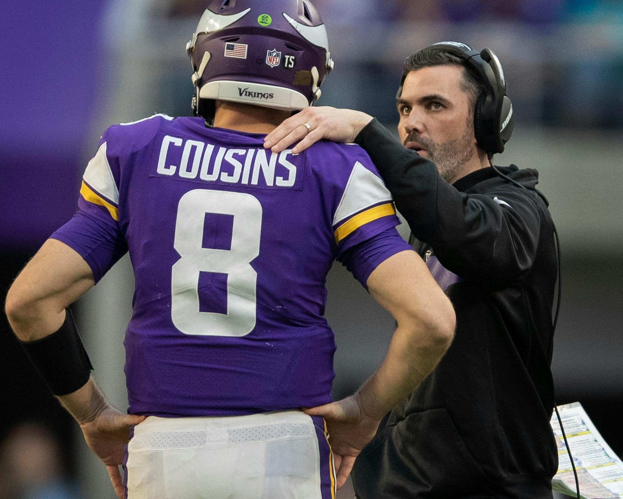 Vikings interim offensive coordinator Kevin Stefanski talked with Kirk Cousins during a game last month.