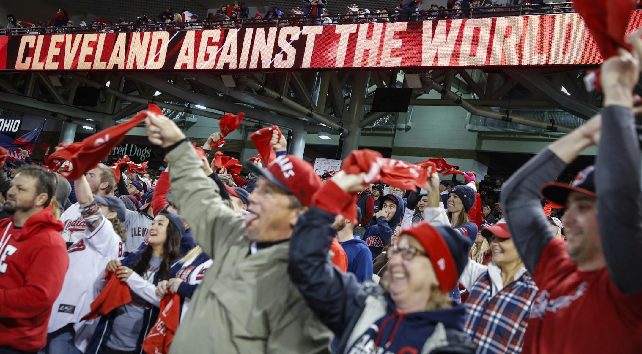 Cleveland Indians fans cheer during a Game 5 watch party for the Major League Baseball World Series against the Chicago Cubs at Progressive Field, Sunday, Oct. 30, 2016, in Cleveland. (AP Photo/John Minchillo)