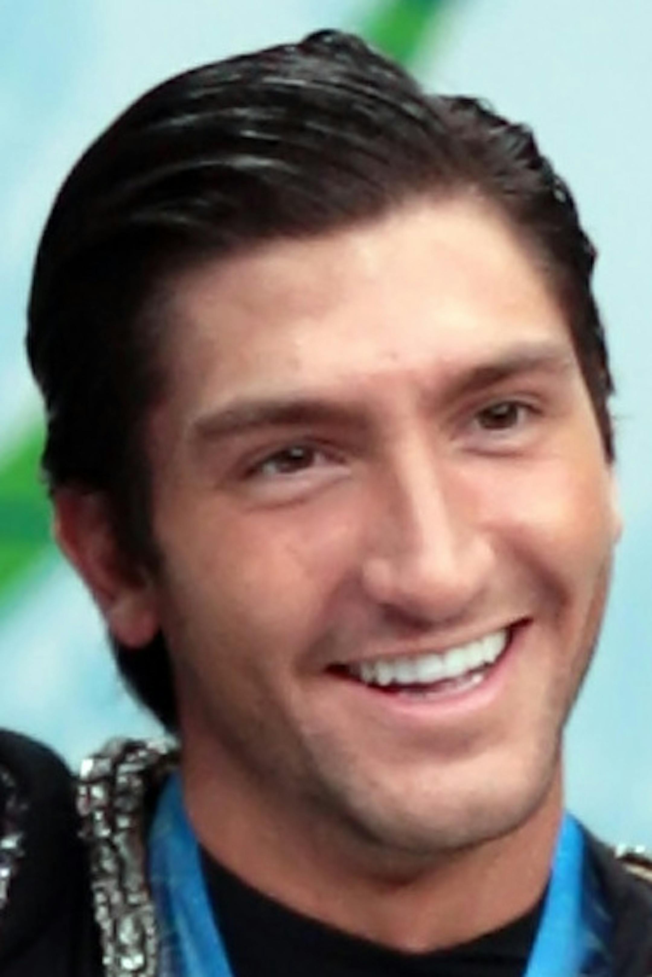 Evan Lysacek of the United States celebrates his gold medal in men's figure skating on Thursday, February 18, 2010, during the 2010 Winter Olympics in Vancouver, British Columbia. (George Bridges/MCT) ORG XMIT: MIN2015032020503214