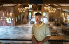 Patrick Winter, owner of Red Barn Farm in Northfield, showed off his rebuilt event barn a year after a devastating tornado. ] GLEN STUBBE &#x2022; gle