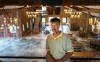 Patrick Winter, owner of Red Barn Farm in Northfield, showed off his rebuilt event barn a year after a devastating tornado. ] GLEN STUBBE &#x2022; gle