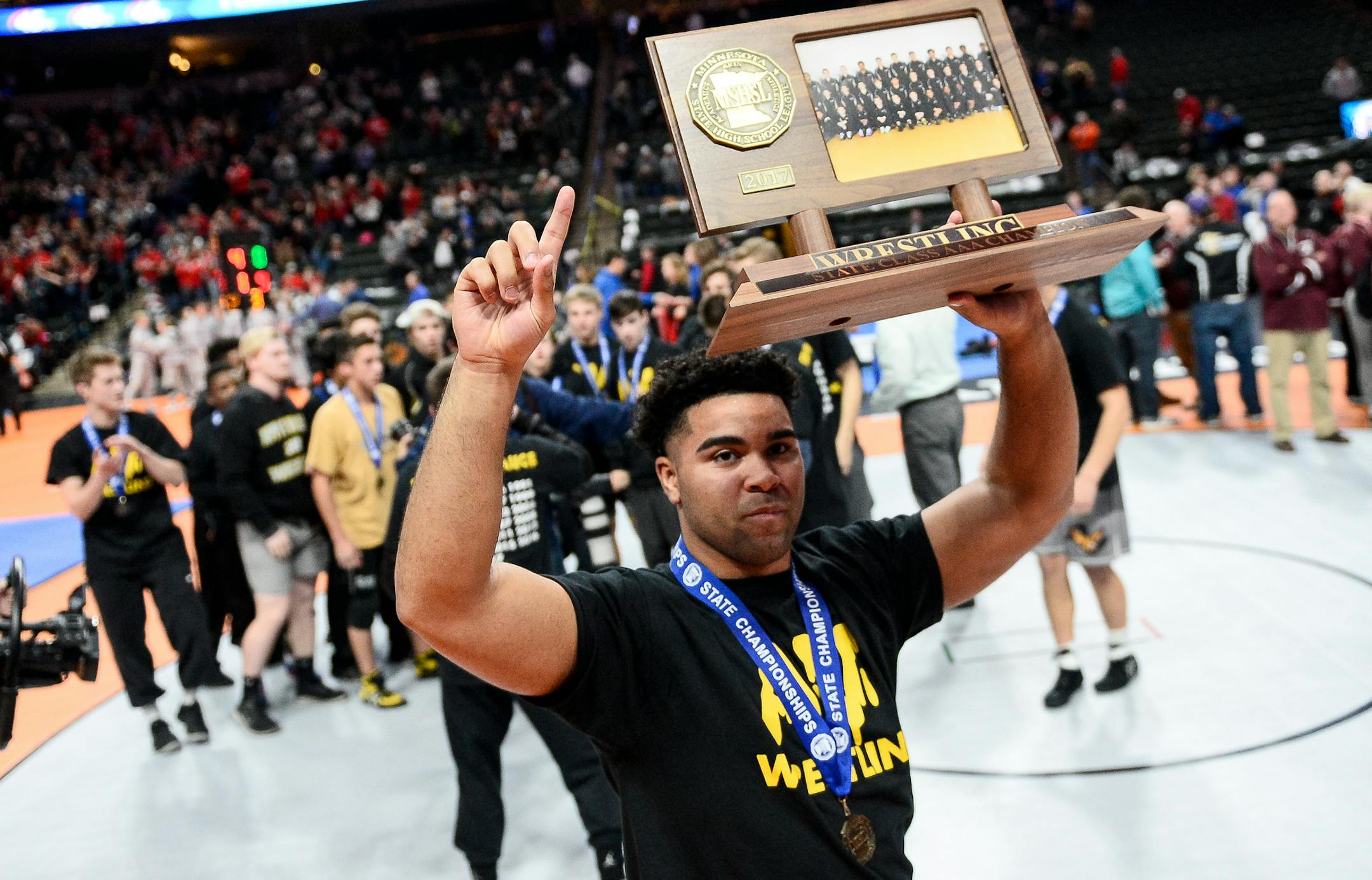 Junior heavyweight Gable Steveson celebrated Apple Valley’s victory over Anoka in the team finals of the Class 3A wrestling championships.