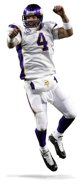 Minnesota Vikings quarterback Brett Favre reacts after throwing for the Vikings' final touchdown in a 38-26 win over the Green Bay Packers in an NFL f