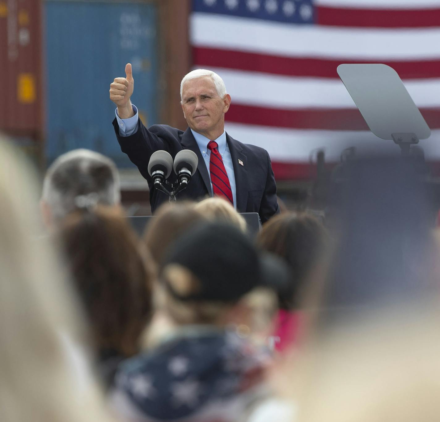 Vice President Mike Pence addressed a crowd of several hundred Republican supporters in Duluth outside Lake Superior Warehousing on Friday. ] ALEX KORMANN • alex.kormann@startribune.com Vice President Mike Pence visited Duluth on Friday to speak at Lake Superior Warehousing in front of a small crowd for a "Workers For Trump" campaign event.