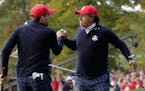 USA's Keegan Bradley congratulates Phil Mickelson during the 2012 Ryder Cup.