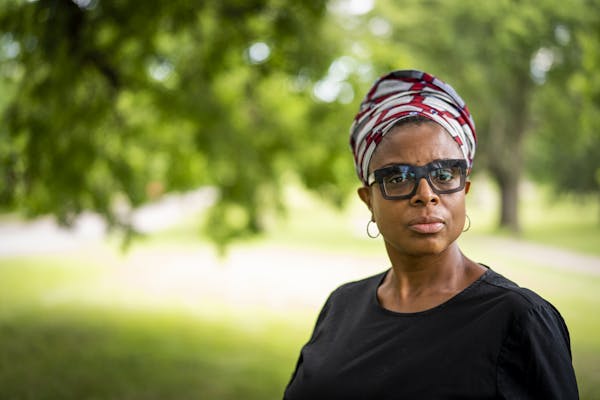 Kimberly Jones posed for a portrait outside her home in Minneapolis.