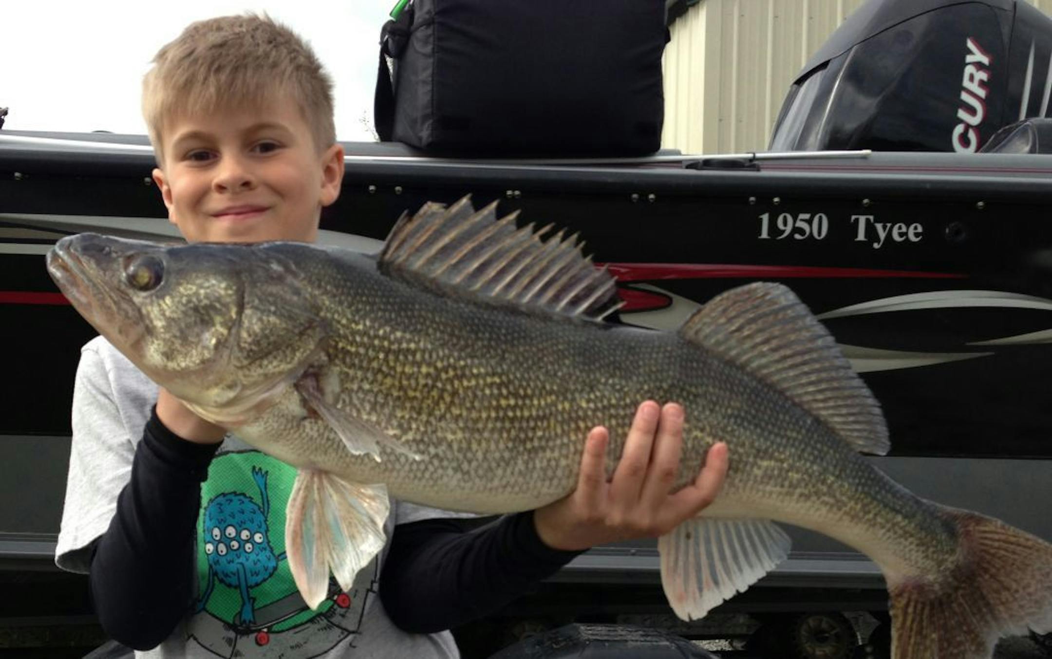 JACKPOT WINNER Jack Adolfson, 8, of Oak Grove, caught this 29-inch walleye on Lake of the Woods. "We had daily fishing contests for the largest fish, which he won each day,'' reported his family. "The day before he had a 24-inch then a 27-inch walleye. He had a great fishing weekend!''