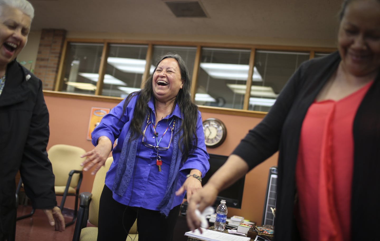 Healer Donna La Chapelle (center) encouraged participants to shake their bodies to music during a talking circle.