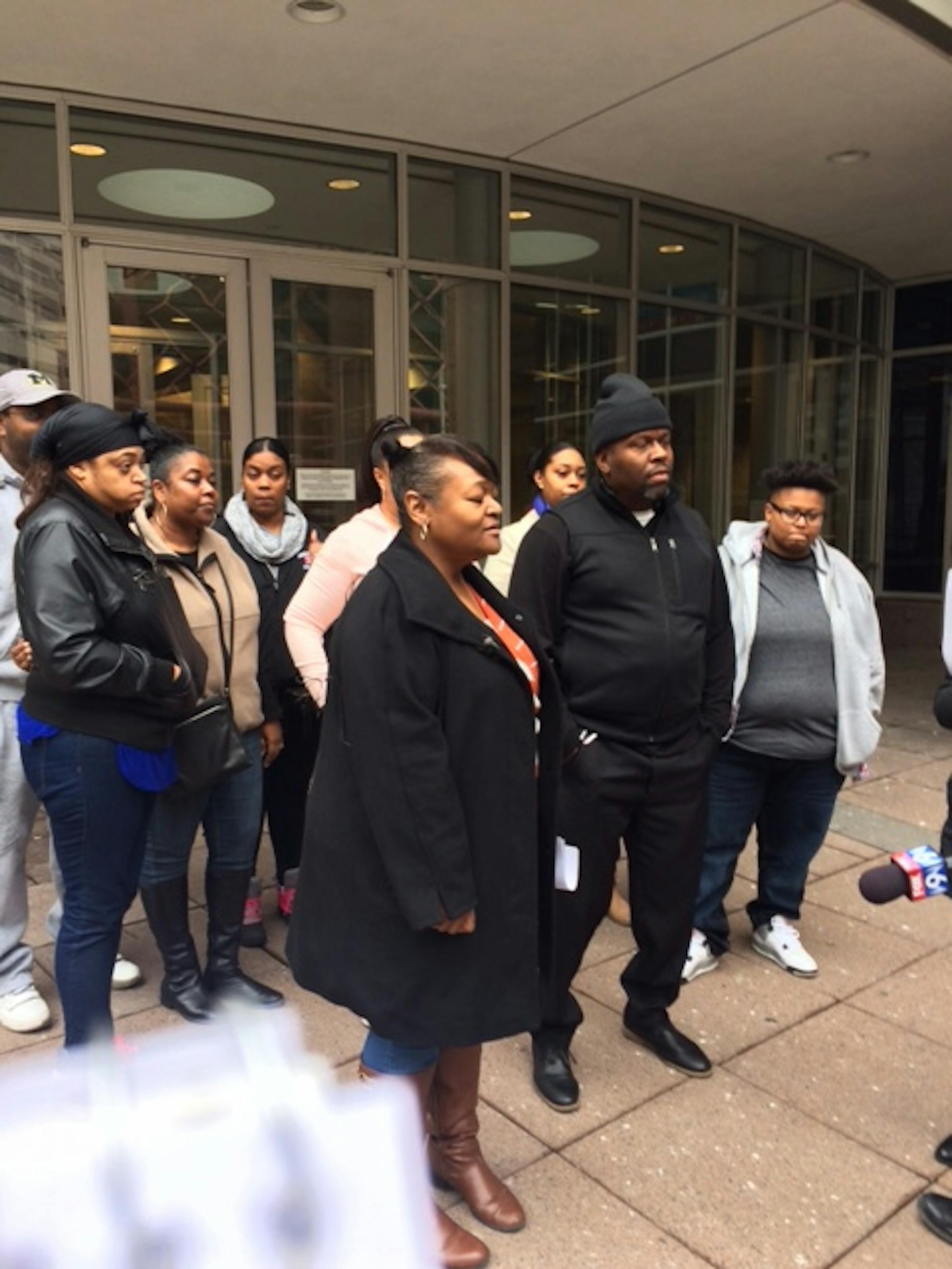 The family of Birdell Beeks, including her daughter Sa'Lesha, gather after the first court appearance of Joshua Ezeka, 20, who is charged with murder in her death.