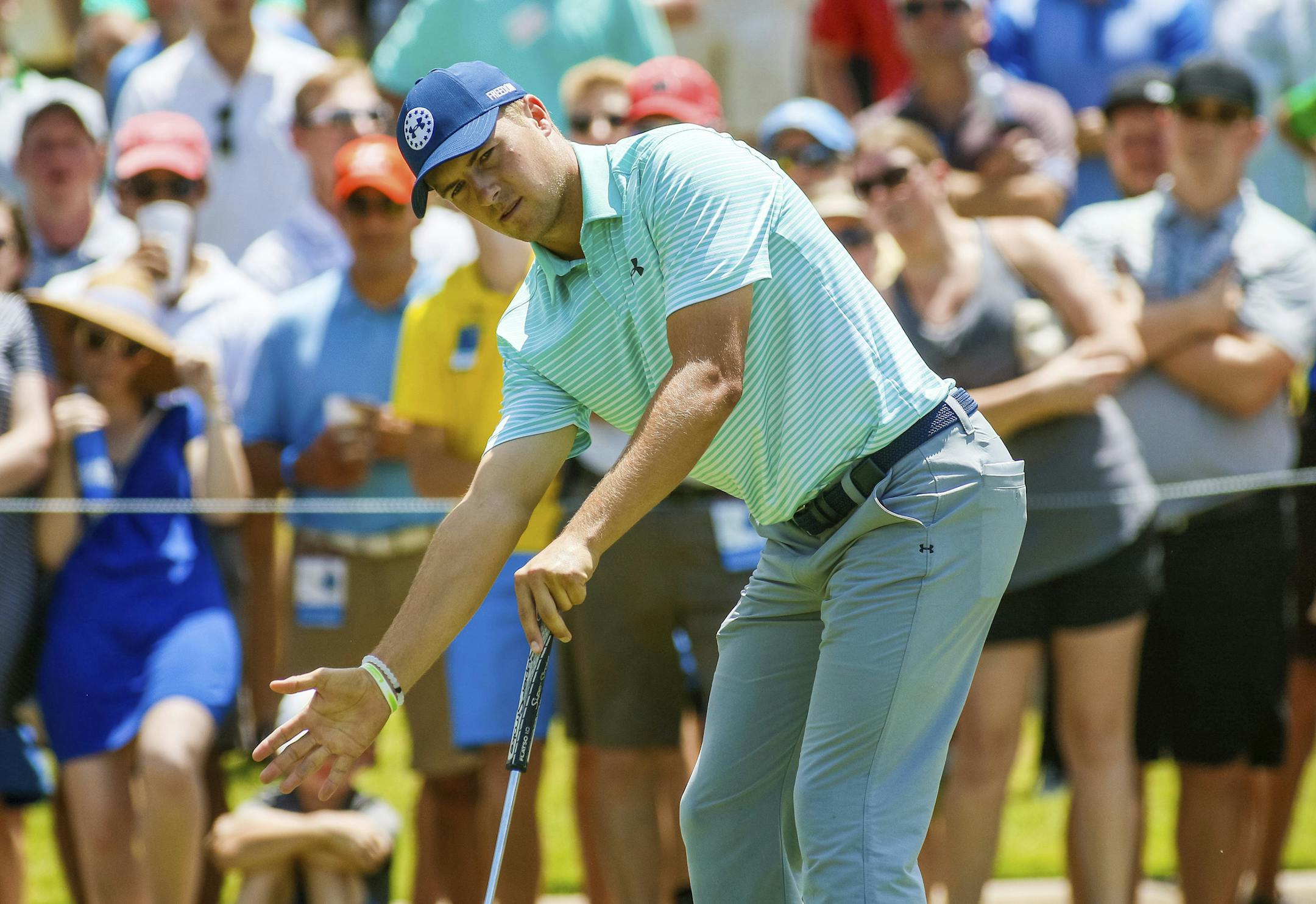 Jordan Spieth asks his putt to break on the ninth green during the second round of the Dean & DeLuca Invitational golf tournament at Colonial Country Club in Fort Worth, Texas, Friday, May 26, 2017. (Ray Carlin/Star-Telegram via AP)