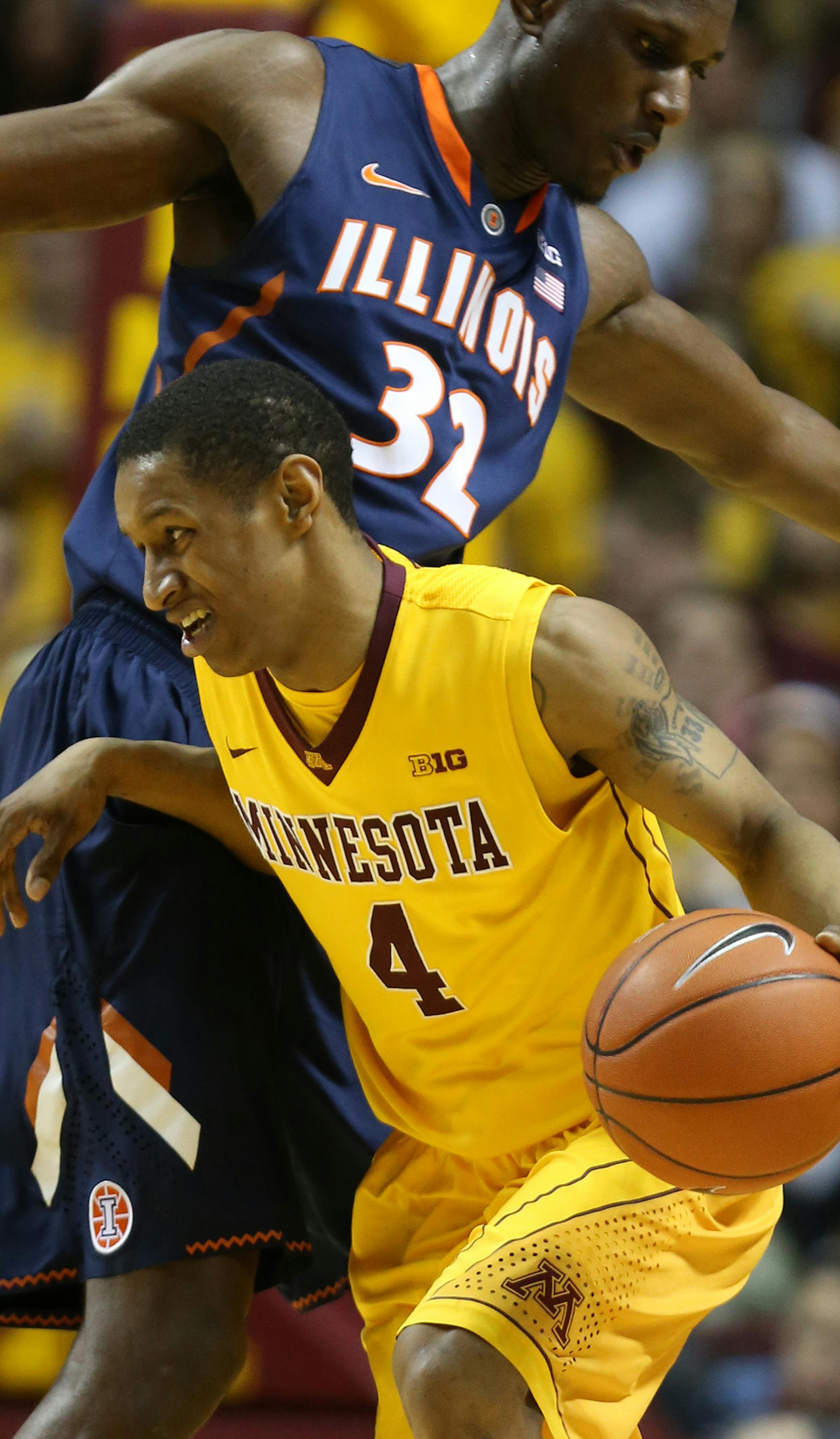 Gopher DeAndre Mathieu drove the ball passed Illinois Nnanna Egwu during the first half at Williams Arena Wednesday, February 19, 2014. ] (KYNDELL HARKNESS/STAR TRIBUNE) kyndell.harkness@startribune.com