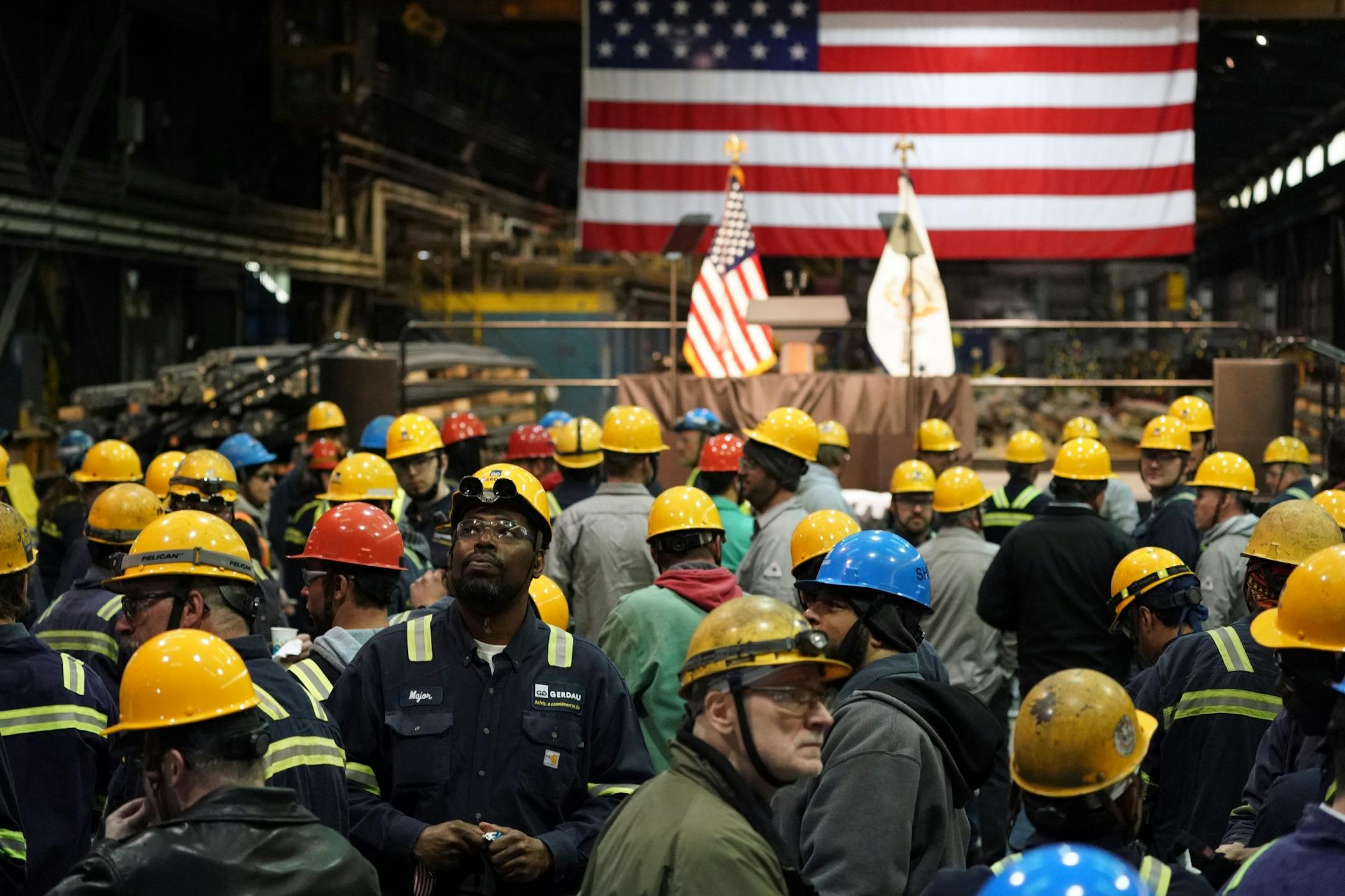 Steel workers waited to see Vice President Mike Pence speak Thursday.