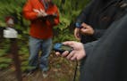 Treasure-hunters use a GPS or special handheld device when geocaching to track a hidden package or &#x201c;cache&#x201d;