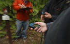 Treasure-hunters use a GPS or special handheld device when geocaching to track a hidden package or &#x201c;cache&#x201d;
