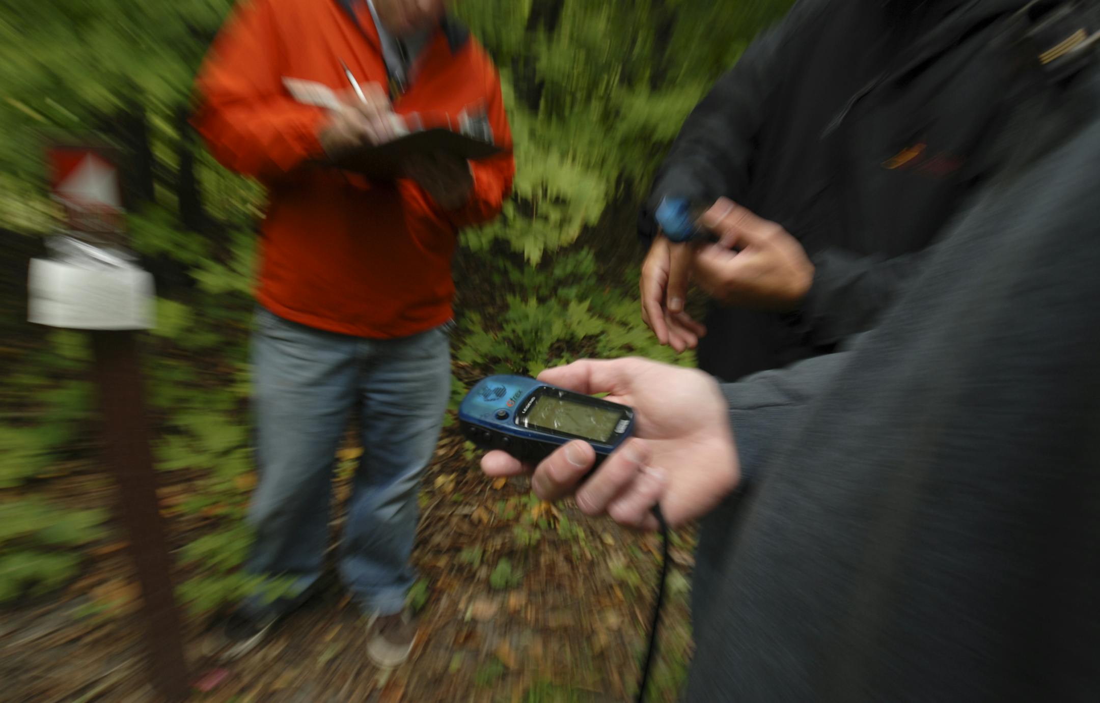 Treasure-hunters use a GPS or special handheld device when geocaching to track a hidden package or “cache”
