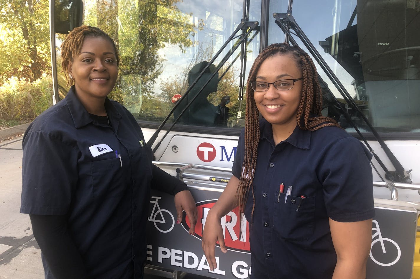 Kira Young, a veteran Metro Transit driver, followed her college-educated daughter, Kadejah Young, into training and a better-paying job as a bus mechanic. Photo: Neal.St.Anthony@startribune.com