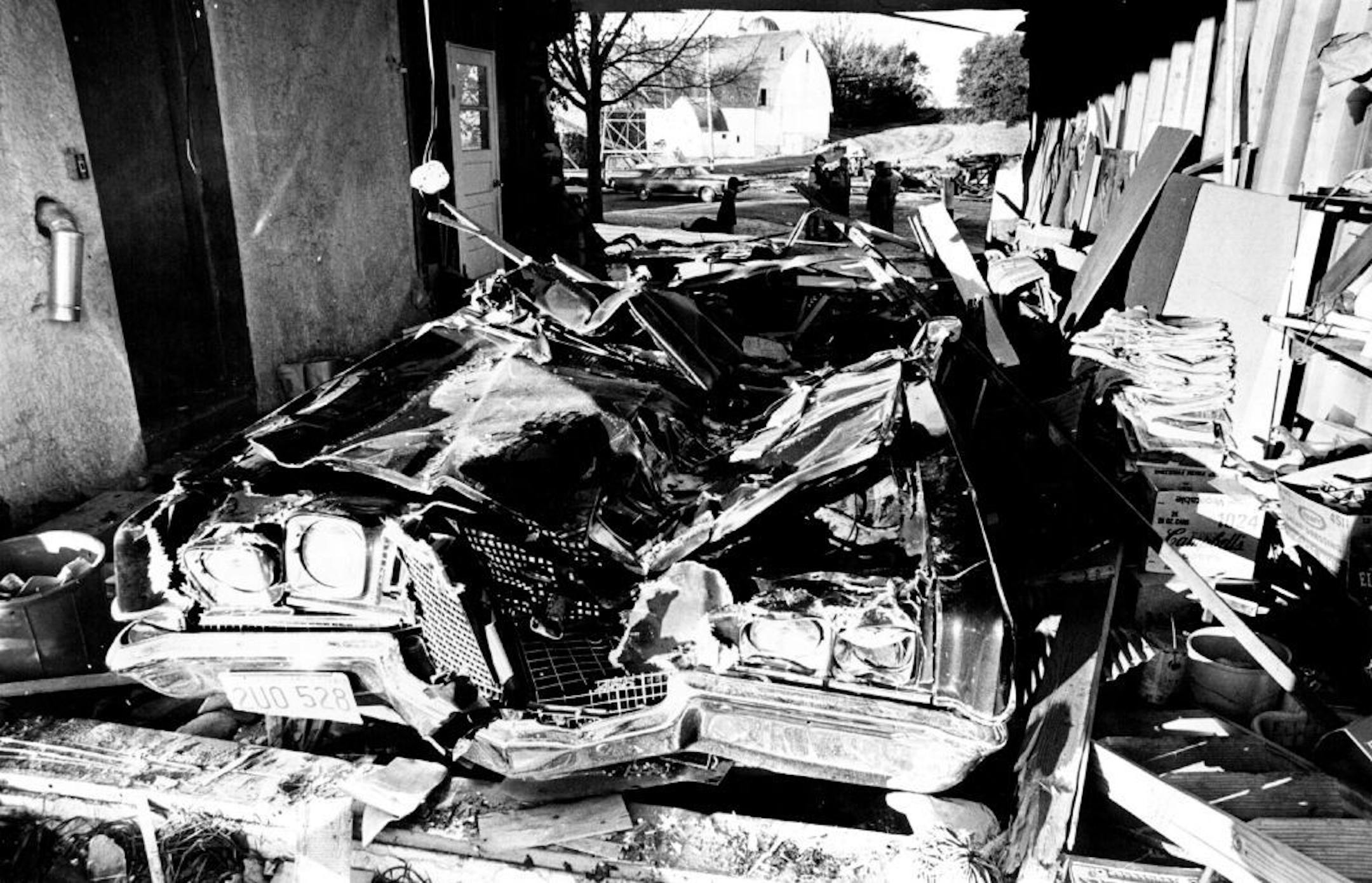 October 24, 1972 Edward Hammer's 1971 car was smashed flat by runaway bulldozer. William Seaman, Minneapolis Star Tribune