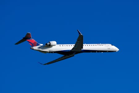 A Delta Connection Endeavor Air CRJ-900LR departs in Freeland, Mich., on Wed., May 1, 2024.