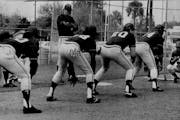 Lou Brock worked with some Twins players during 1986 spring training. The players (right to left) were Kirby Puckett, Billy Beane, Ron Washington and 