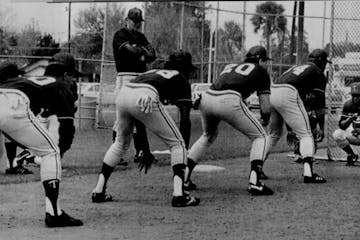 Lou Brock worked with some Twins players during 1986 spring training. The players (right to left) were Kirby Puckett, Billy Beane, Ron Washington and 