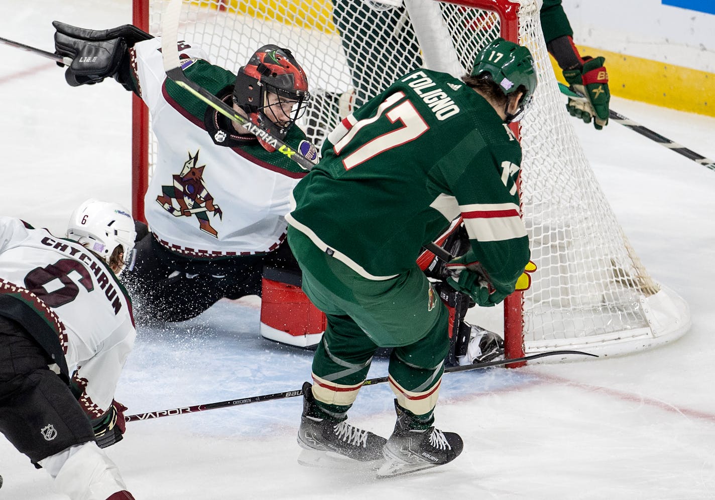 Marcus Foligno (17) of the Minnesota Wild gets the puck past Arizona Coyotes goalie Scott Wedgewood (31) in the third period Tuesday, Nov. 30, 2021 at Xcel Energy Center in St. Paul, Minn. ] CARLOS GONZALEZ • cgonzalez@startribune.com